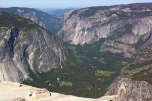 Tweeting from the top of Half Dome. Photo by Sagano