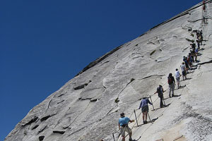Climbing Half Dome by Greg Foster
