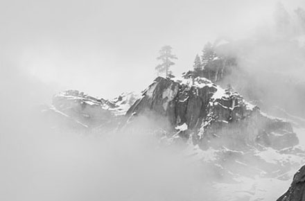 Photo of the Day: Cloud Shrouded Cliffs and Snow by G. Dan Mitchell